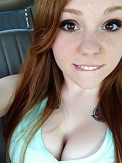 Amateur redhead girl with blue