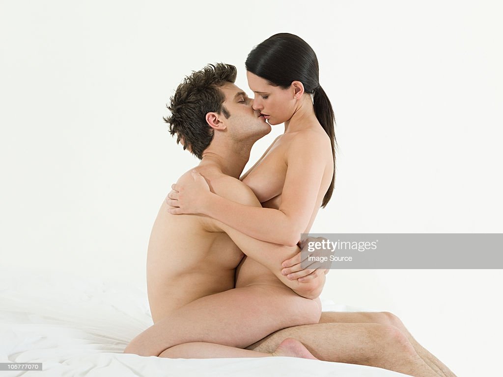 Photo of a man and woman standing naked having sex